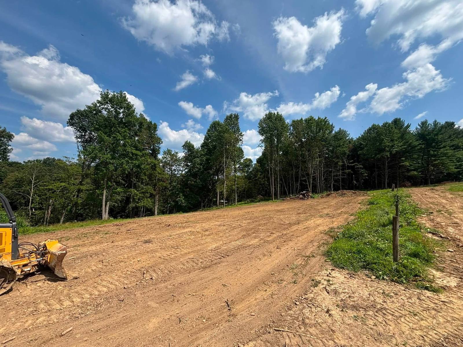 Large cleared and graded hillside property after grading work